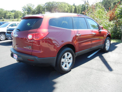 chevrolet traverse 2010 red suv 2lt gasoline 6 cylinders all whee drive 6 speed automatic 55391