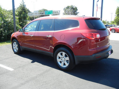 chevrolet traverse 2010 red suv 2lt gasoline 6 cylinders all whee drive 6 speed automatic 55391