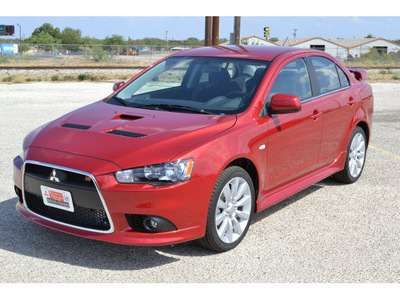 mitsubishi lancer 2011 dk  red sedan ralliart gasoline 4 cylinders all whee drive automatic 76903