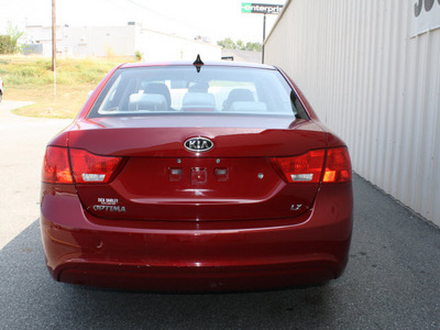 kia optima 2009 red sedan lx gasoline 4 cylinders front wheel drive automatic 27215