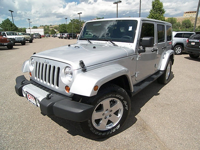 jeep wrangler unlimited 2011 silver suv sahara gasoline 6 cylinders 4 wheel drive automatic 81212