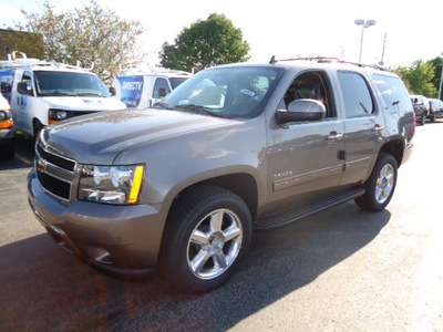 chevrolet tahoe 2011 brown suv lt flex fuel 8 cylinders 4 wheel drive automatic 60007