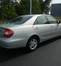 toyota camry 2004 silver sedan le gasoline 6 cylinders front wheel drive automatic with overdrive 55448