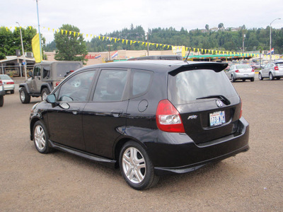 honda fit 2007 black hatchback sport gasoline 4 cylinders front wheel drive 5 speed manual 98632