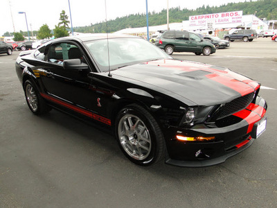 ford mustang 2007 blackred coupe shelby gt 500 gasoline 8 cylinders rear wheel drive 6 speed manual 98032