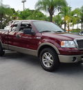 ford f 150 2006 red lariat gasoline 8 cylinders rear wheel drive automatic 33177