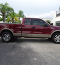 ford f 150 2006 red lariat gasoline 8 cylinders rear wheel drive automatic 33177