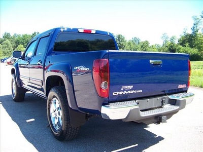 gmc canyon 2011 blue sle high stance gasoline 5 cylinders 4 wheel drive 4 speed automatic 44024