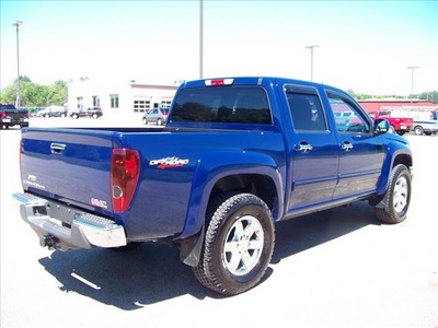 gmc canyon 2011 blue sle high stance gasoline 5 cylinders 4 wheel drive 4 speed automatic 44024