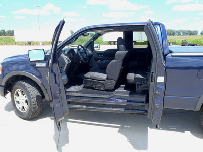ford f 150 2004 blue fx4 gasoline 8 cylinders 4 wheel drive automatic 62708