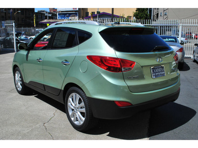 hyundai tucson 2011 green gls gasoline 4 cylinders front wheel drive automatic 94010