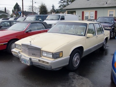cadillac deville 1990 yellow sedan gasoline 8 cylinders front wheel drive automatic 97216