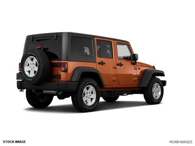 jeep wrangler unlimited 2011 orange suv sport gasoline 6 cylinders 4 wheel drive automatic 33021