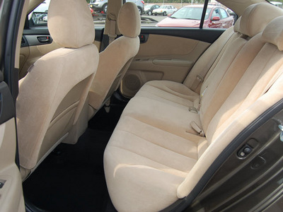 kia optima 2010 brown sedan lx gasoline 4 cylinders front wheel drive automatic 99336