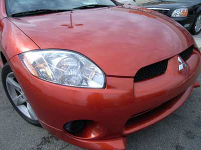 mitsubishi eclipse 2008 orange hatchback gasoline 4 cylinders front wheel drive automatic 46219