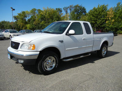 ford f 150 2000 off white pickup truck 4x4 xlt super cab gasoline 8 cylinders 4 wheel drive automatic with overdrive 55321