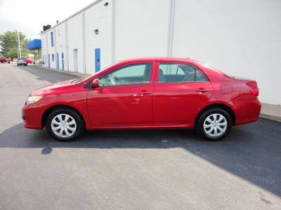 toyota corolla 2009 red sedan le gasoline 4 cylinders front wheel drive automatic 45344