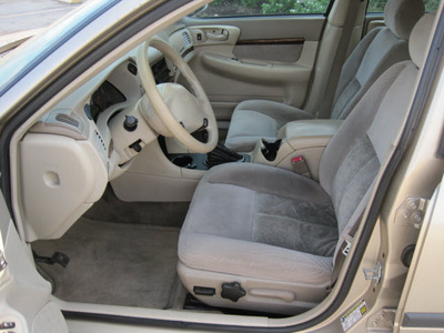chevrolet impala 2005 tan sedan gasoline 6 cylinders front wheel drive automatic 77037