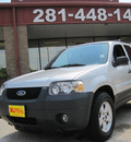 ford escape 2006 silver suv xlt gasoline 6 cylinders all whee drive automatic 77037