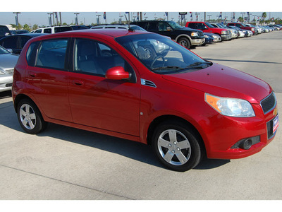 chevrolet aveo 2009 red hatchback lt w 1lt gasoline 4 cylinders front wheel drive automatic 77090