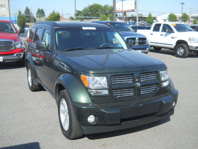 dodge nitro 2010 dk  green suv sxt gasoline 6 cylinders 4 wheel drive automatic 99212