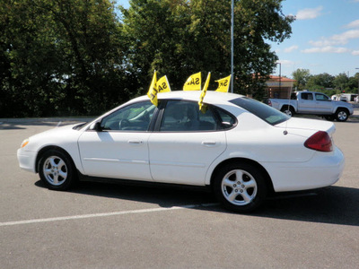 ford taurus 2003 white sedan ses gasoline 6 cylinders front wheel drive automatic with overdrive 56001