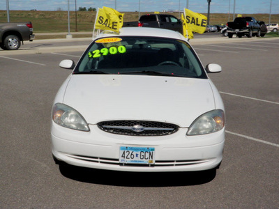 ford taurus 2003 white sedan ses gasoline 6 cylinders front wheel drive automatic with overdrive 56001