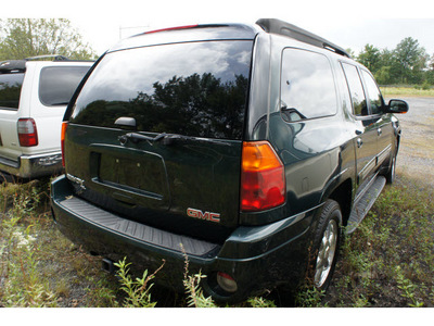 gmc envoy xl 2003 dk  green suv slt gasoline 6 cylinders 4 wheel drive automatic with overdrive 08902