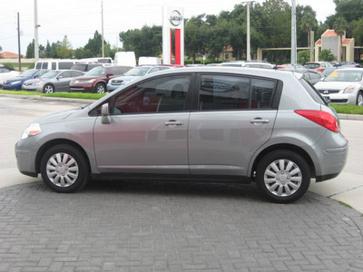 nissan versa 2009 gray hatchback gasoline 4 cylinders front wheel drive automatic 33884