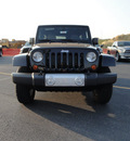 jeep wrangler unlimited 2012 black suv sahara gasoline 6 cylinders 4 wheel drive automatic 60915