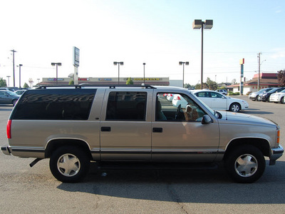 gmc suburban 1999 pewter suv gasoline 8 cylinders 4 wheel drive 4 speed automatic 99336