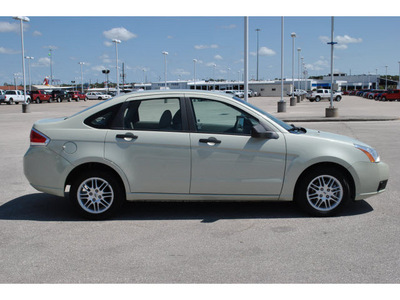 ford focus 2010 green sedan se gasoline 4 cylinders front wheel drive automatic with overdrive 77388
