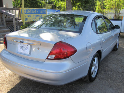 ford taurus 2003 silver sedan ses gasoline 6 cylinders front wheel drive automatic 77379