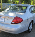 ford taurus 2003 silver sedan ses gasoline 6 cylinders front wheel drive automatic 77379