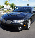 pontiac gto 2005 black coupe gasoline 8 cylinders rear wheel drive 6 speed manual 98371