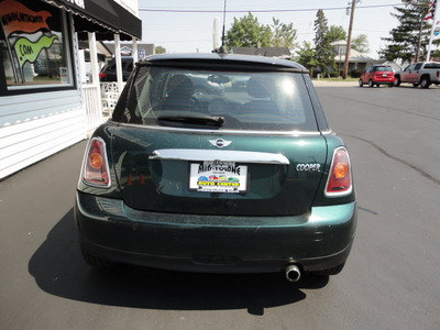 mini cooper 2007 dk  green hatchback gasoline 4 cylinders front wheel drive 5 speed manual 45005