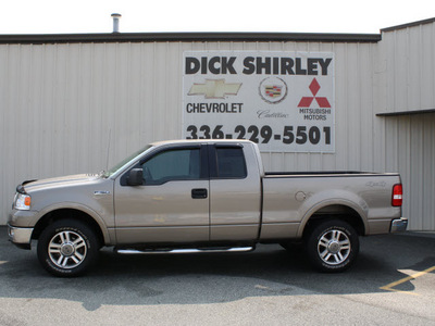 ford f 150 2005 beige lariat gasoline 8 cylinders 4 wheel drive automatic 27215