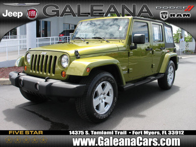 jeep wrangler unlimited 2007 grn suv sahara gasoline 6 cylinders rear wheel drive not specified 33912