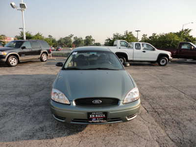 ford taurus 2006 lt  green sedan se gasoline 6 cylinders front wheel drive automatic with overdrive 60546