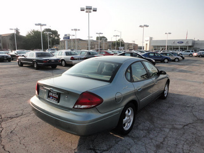 ford taurus 2006 lt  green sedan se gasoline 6 cylinders front wheel drive automatic with overdrive 60546