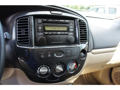 mazda tribute 2006 gray suv i gasoline 4 cylinders all whee drive automatic with overdrive 07702