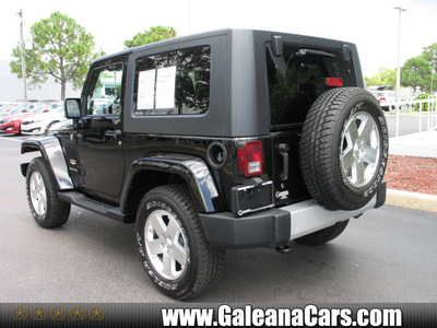 jeep wrangler 2009 blk suv sahara gasoline 6 cylinders 4 wheel drive not specified 33912