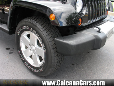 jeep wrangler 2009 blk suv sahara gasoline 6 cylinders 4 wheel drive not specified 33912