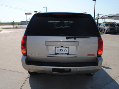 gmc yukon 2009 silver suv gasoline 8 cylinders 2 wheel drive automatic 76087