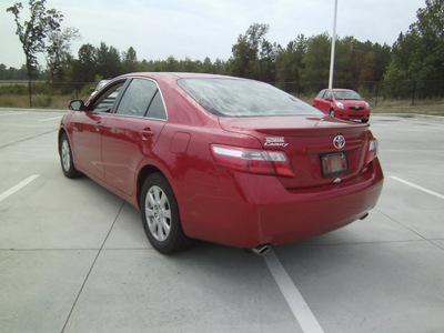 toyota camry 2007 red sedan xle v6 gasoline 6 cylinders front wheel drive automatic 75503