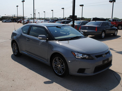scion tc 2011 gray hatchback gasoline 4 cylinders front wheel drive 6 speed manual 76087