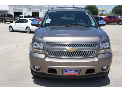 chevrolet tahoe 2011 brown suv lt flex fuel 8 cylinders 2 wheel drive automatic 77090