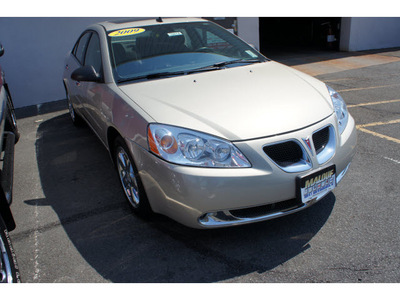 pontiac g6 2009 gold sedan gasoline 6 cylinders front wheel drive automatic with overdrive 08902