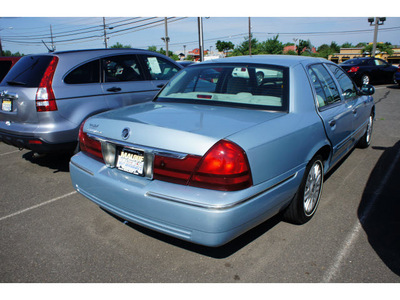 mercury grand marquis 2004 lt  blue sedan gs gasoline 8 cylinders rear wheel drive automatic with overdrive 08902