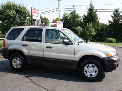 ford escape 2006 sand suv xls gasoline 4 cylinders front wheel drive automatic with overdrive 07702
